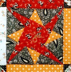 Laced Star - фрагмент рождественского коврика. Кликните на картинку, чтобы получить схемы для шитья!